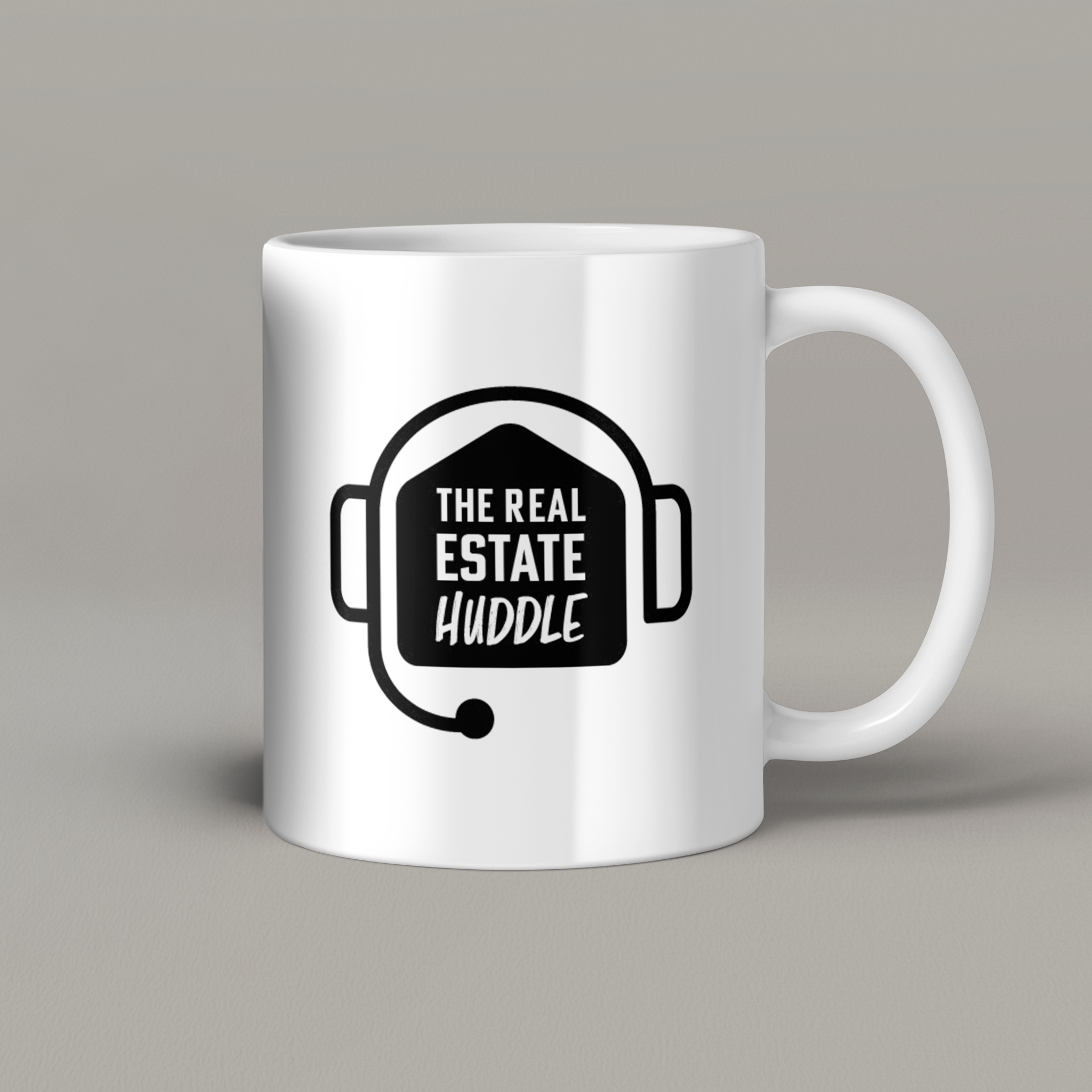 The Real Estate Huddle branded coffee mug